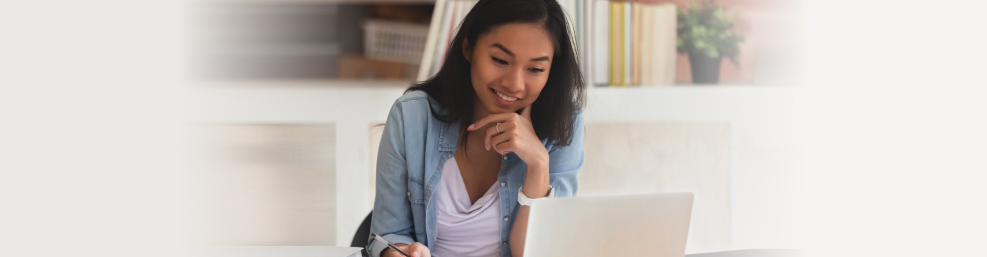 woman using her laptop