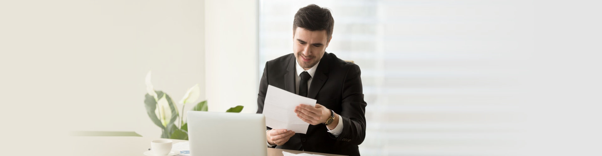 man looking at a document